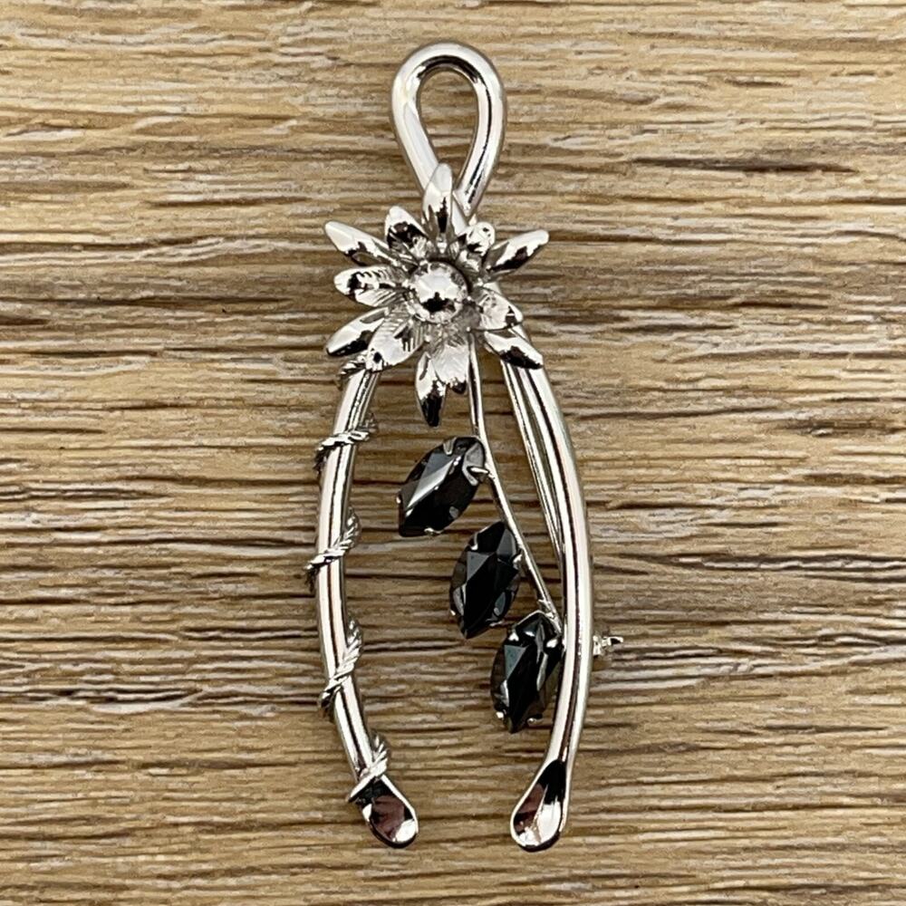 Silver Tone Flower Ribbon and Marquise-cut Black Rhinestone Brooch/Pin